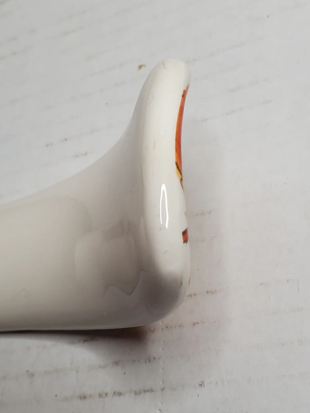 Ceramic Fall-Leaf Spoon Rest in White with Orange and Brown Motif